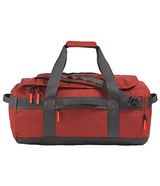 The North Face Base Camp Voyager Duffel 62L Iron Clay/Anthracite Grey/Lava Red - side view with detachable padded shoulder straps and grab handles