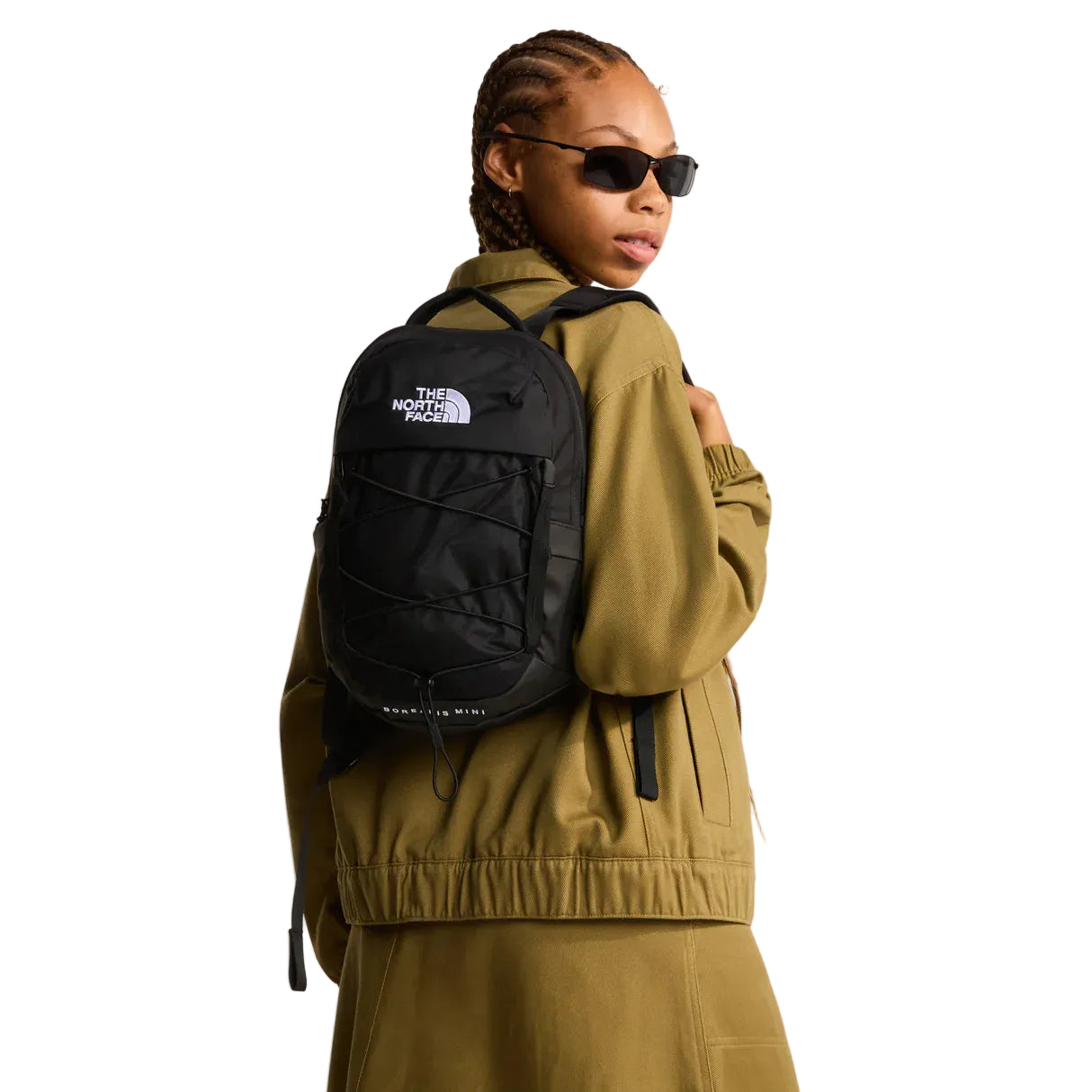 The North Face Borealis Mini Backpack 10L - side view with dual water bottle pockets and reflective details