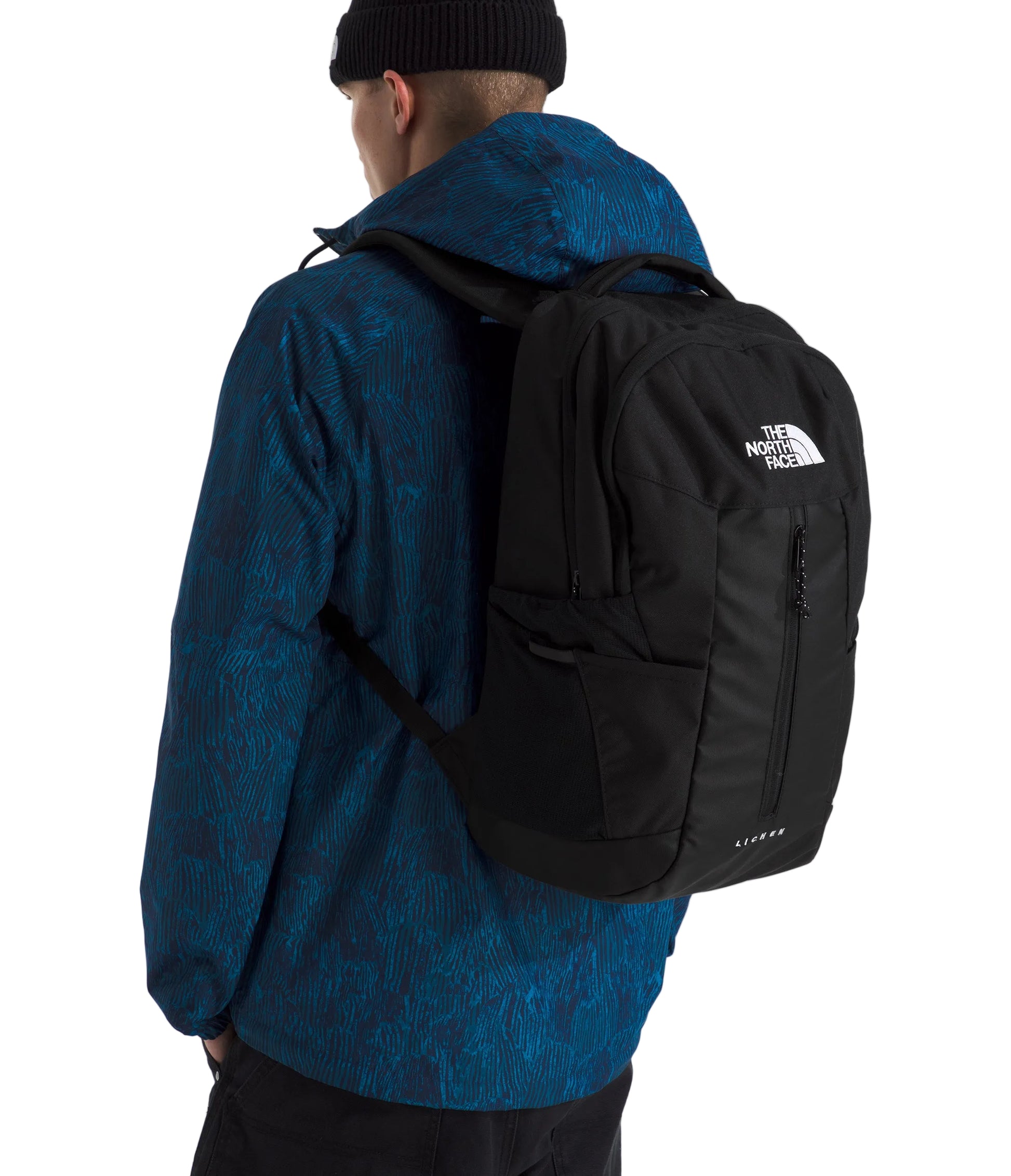 The North Face Lichen Daypack 28L - side view with dual water bottle pockets and stretch-mesh storage
