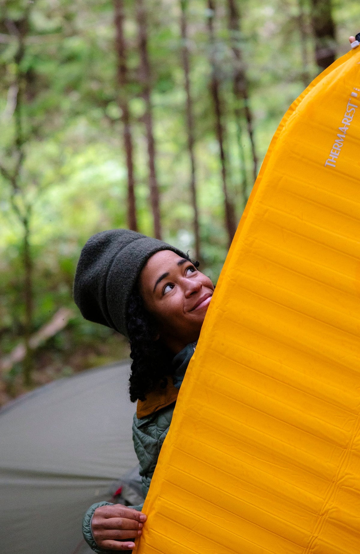 Therm-a-Rest Trail ProLite Sleeping Pad in Mango, packed for hiking