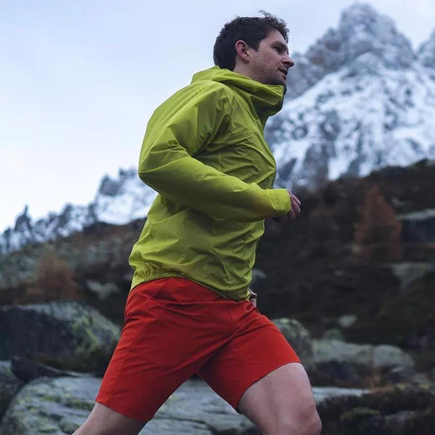 Rab Men's Phantom Waterproof Pull-On Jacket in Acid - worn, running